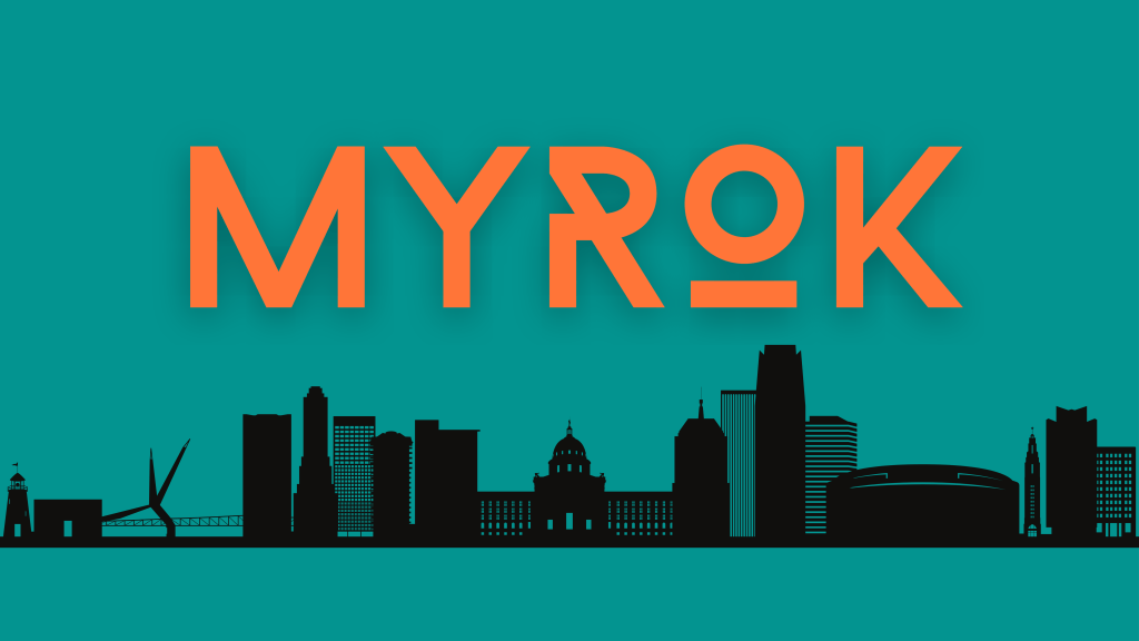 Logo of MYROK featuring the word 'MYROK' in bold orange letters against a teal background with a silhouette of an urban landscape.